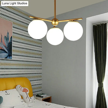 Modern gold 3-light white frosted glass globe chandelier bedroom