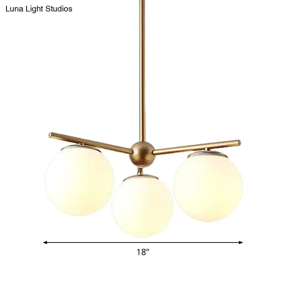 Modern gold 3-light white frosted glass globe chandelier bedroom