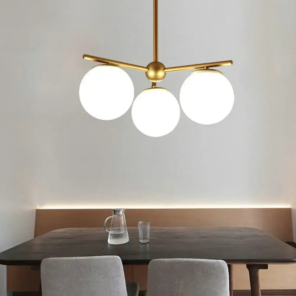 Modern gold 3-light white frosted glass globe chandelier bedroom