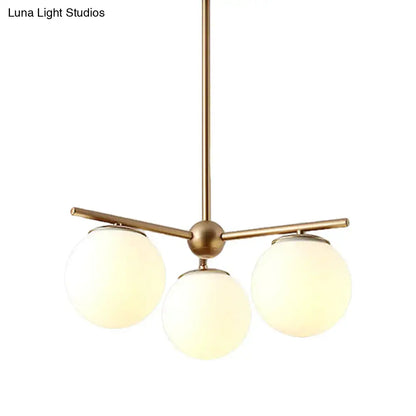 Modern gold 3-light white frosted glass globe chandelier bedroom