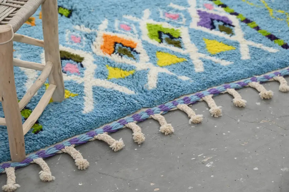 Blue geometric moroccan handmade azilal rug bedroom decor with tassels