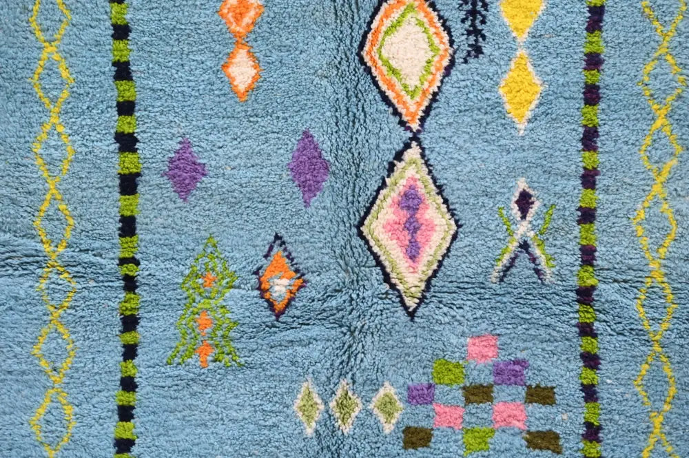 Blue geometric moroccan handmade azilal rug bedroom decor with tassels