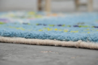 Blue geometric moroccan handmade azilal rug bedroom decor with tassels