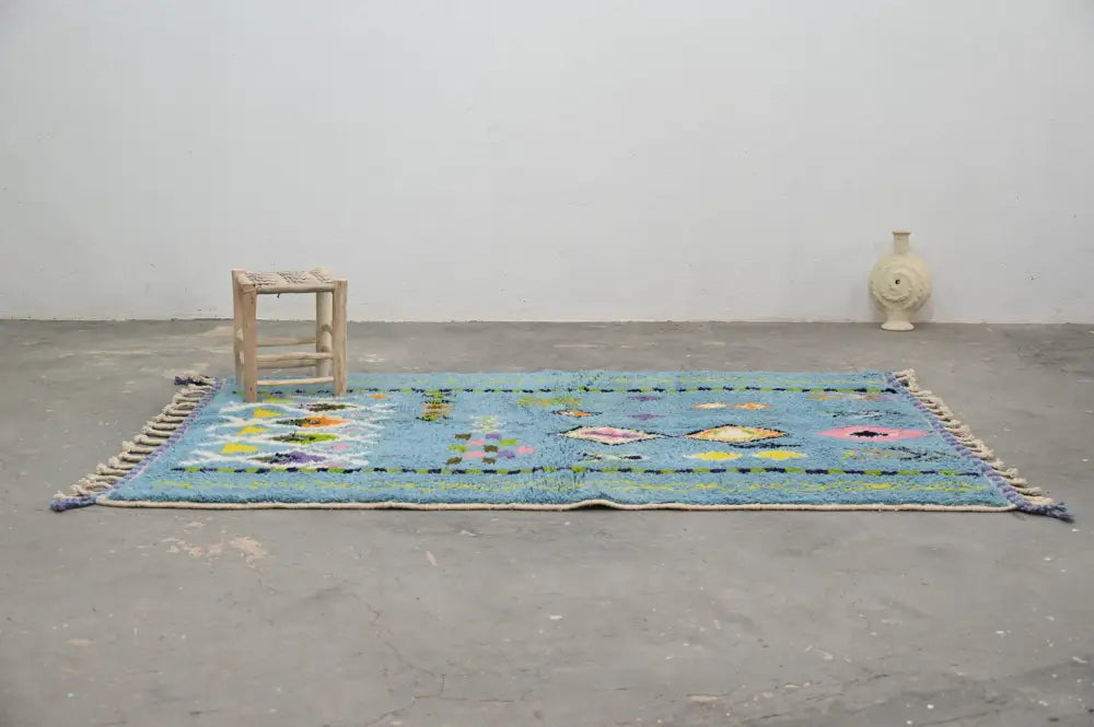 Blue geometric moroccan handmade azilal rug bedroom decor with tassels