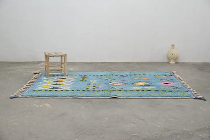Blue geometric moroccan handmade azilal rug bedroom decor with tassels