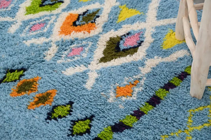 Blue geometric moroccan handmade azilal rug bedroom decor with tassels