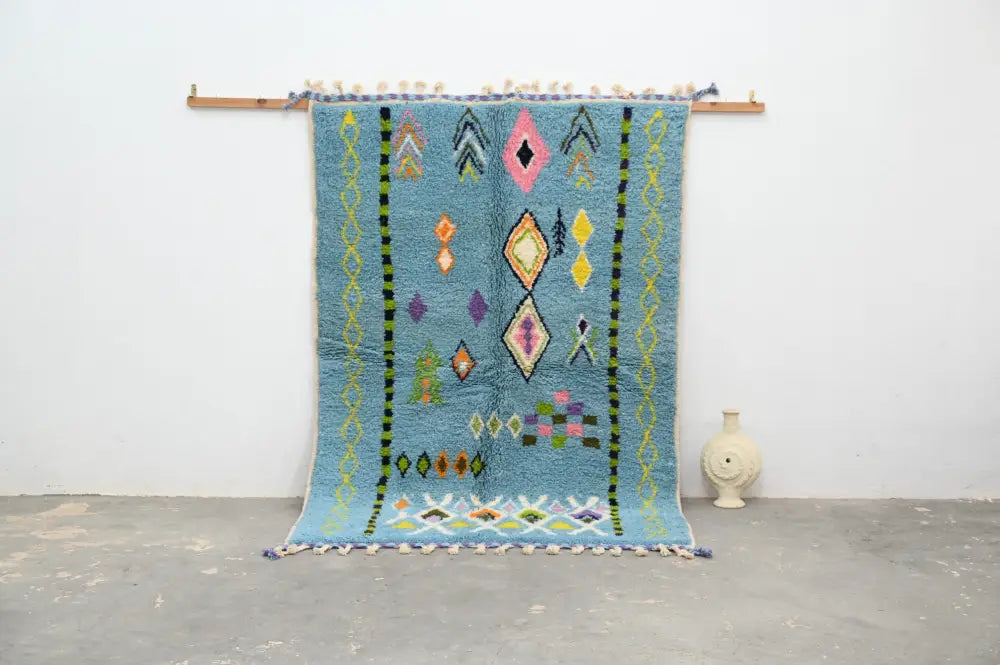 Blue geometric moroccan handmade azilal rug bedroom decor with tassels