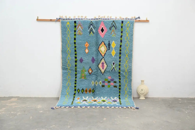 Blue geometric moroccan handmade azilal rug bedroom decor with tassels
