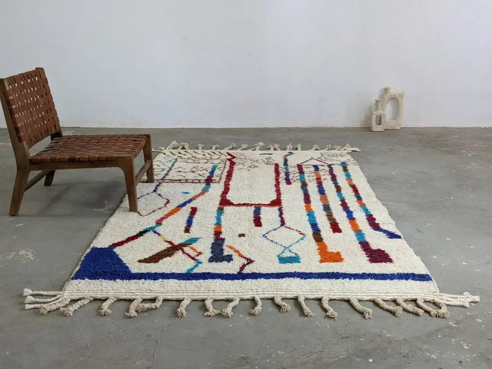 Handmade beige azilal rug with geometric patterns – living room decor