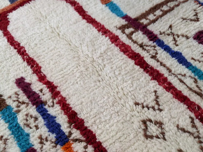 Handmade beige azilal rug with geometric patterns – living room decor