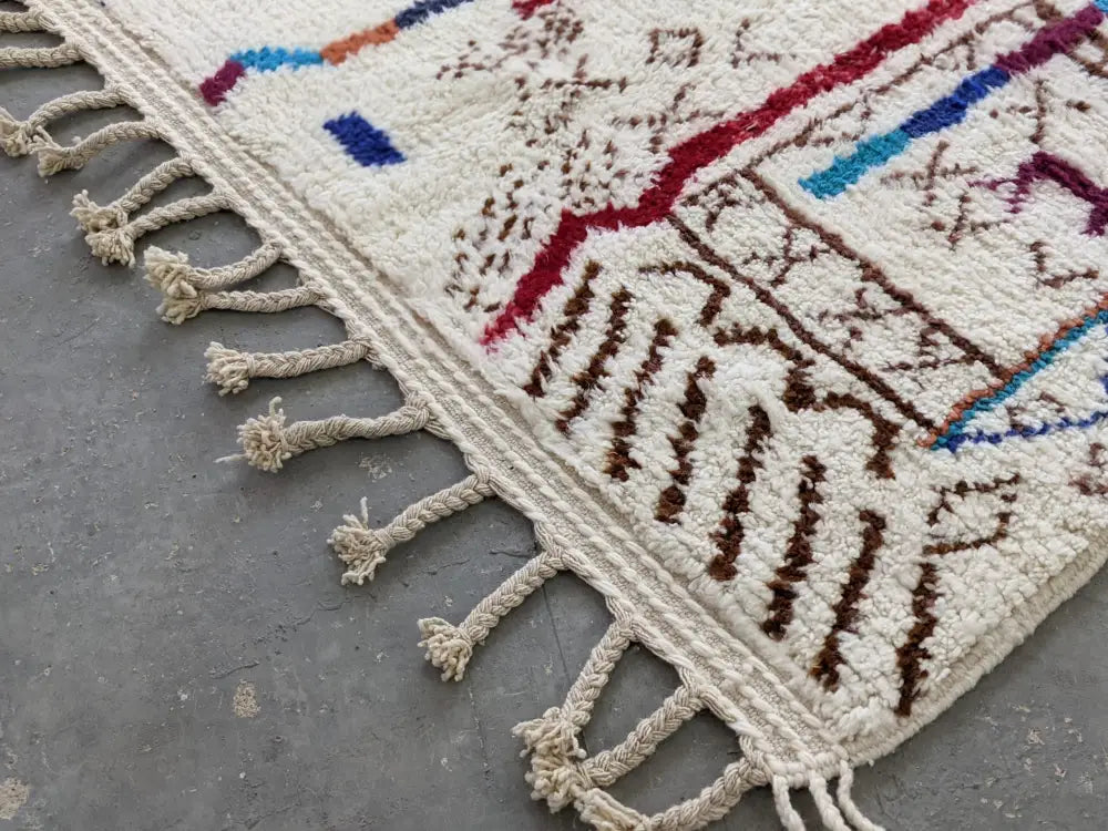 Handmade beige azilal rug with geometric patterns – living room decor