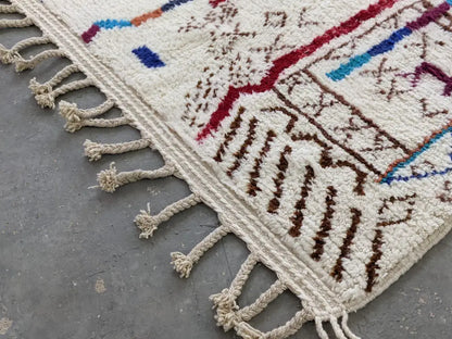 Handmade beige azilal rug with geometric patterns – living room decor