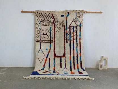 Handmade beige azilal rug with geometric patterns – living room decor