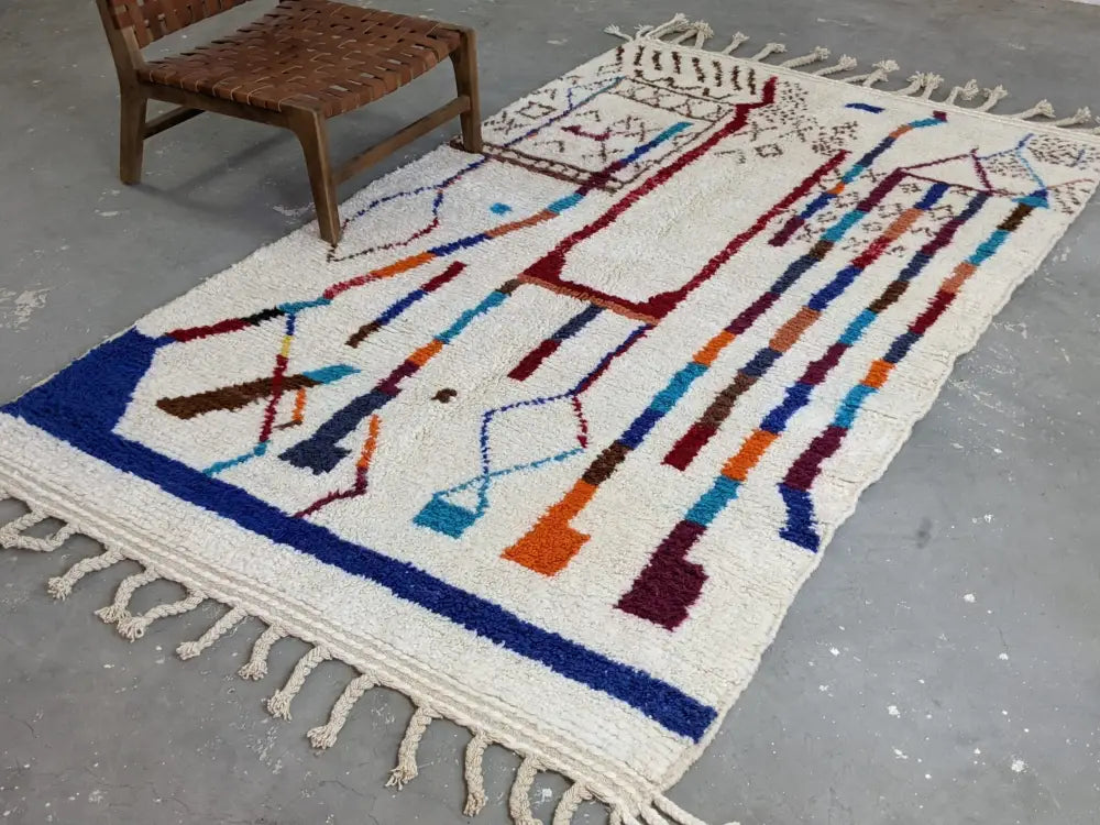 Handmade beige azilal rug with geometric patterns – living room decor