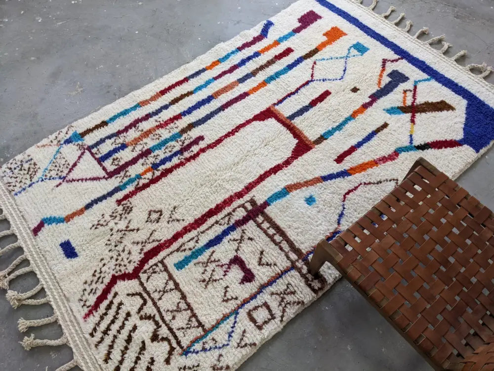 Handmade beige azilal rug with geometric patterns – living room decor