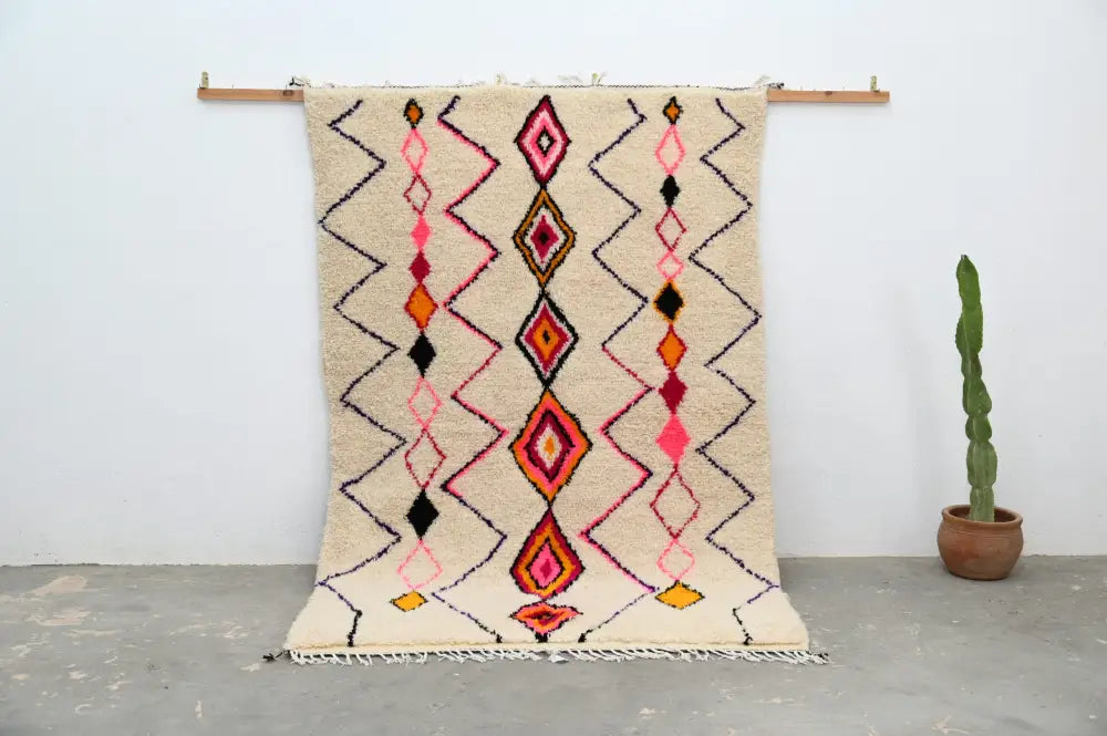 Handmade beige azilal rug with geometric patterns for living room