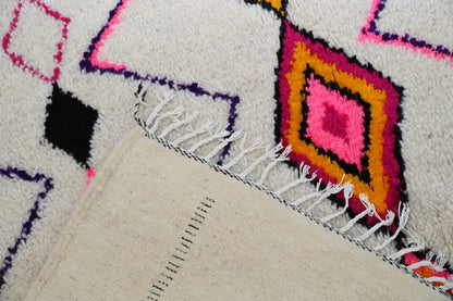 Handmade beige azilal rug with geometric patterns for living room