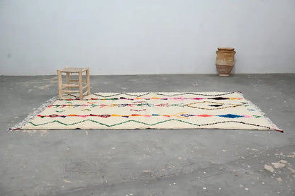 Beige moroccan handmade azilal rug with geometric patterns living room