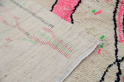 Beige and pink moroccan handmade azilal rug bedroom decor