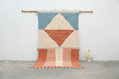 Blue and terracotta moroccan handmade azilal rug bedroom decor