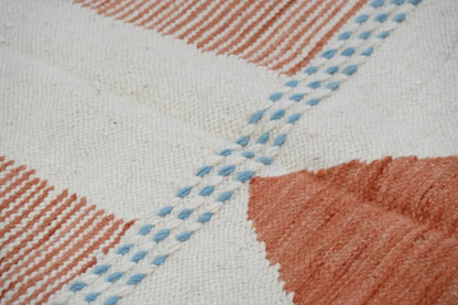 Blue and terracotta moroccan handmade azilal rug bedroom decor