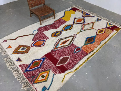 Vibrant cream geometric moroccan handmade azilal rug bedroom decor