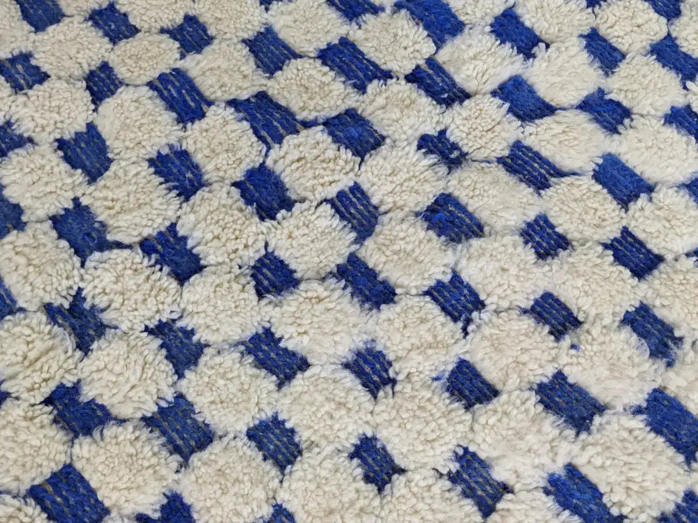 Blue and cream checkered moroccan handmade beni ouarain rug bedroom