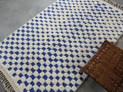 Blue and cream checkered moroccan handmade beni ouarain rug bedroom