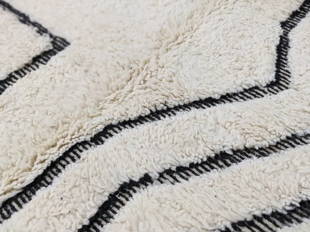 Handmade beni ouarain rug cream & black geometric living room decor