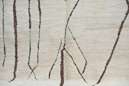 Handmade beige & dark brown beni ouarain rug bedroom geometric decor