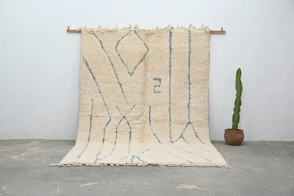 Handmade beni ouarain cream & blue rug bedroom moroccan wool decor