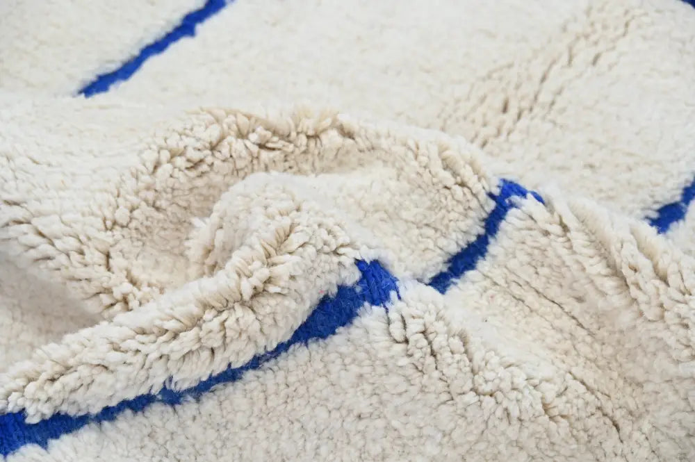 Handmade beige & blue beni ouarain rug – living room geometric decor