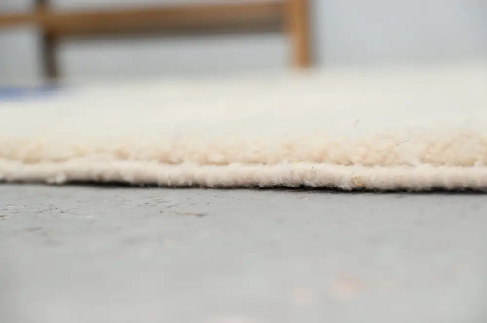 Handmade beige & blue beni ouarain rug – living room geometric decor