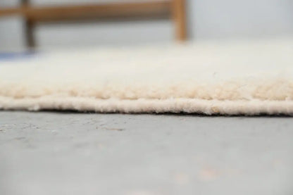 Handmade beige & blue beni ouarain rug – living room geometric decor