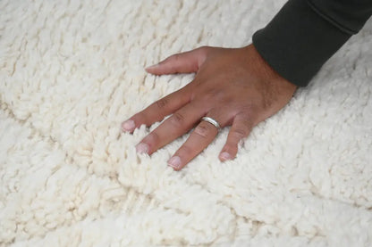 Handmade cream geometric beni ouarain rug for living room