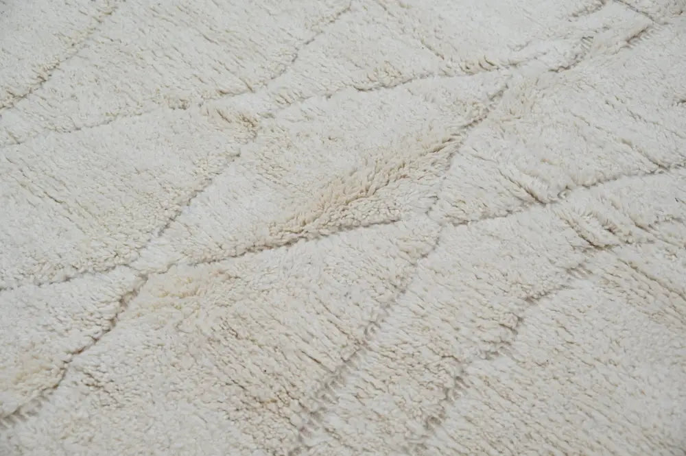 Handmade cream geometric beni ouarain rug for living room