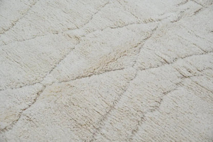 Handmade cream geometric beni ouarain rug for living room