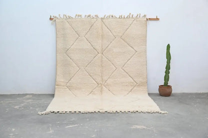 Handmade beige beni ouarain rug diamond pattern bedroom decor