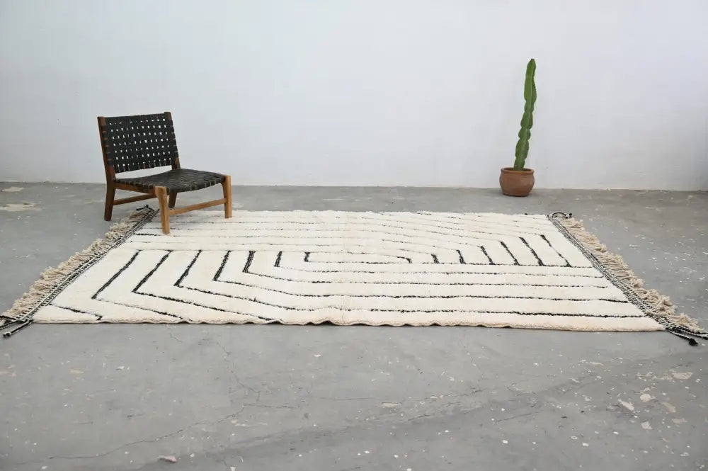 Handmade beni ouarain rug cream and black geometric living room decor