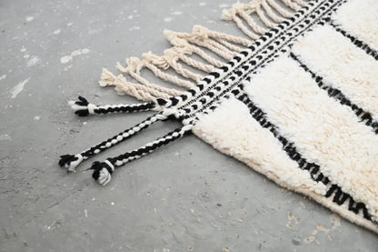 Handmade beni ouarain rug cream and black geometric living room decor