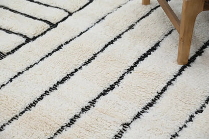 Handmade beni ouarain rug cream and black geometric living room decor