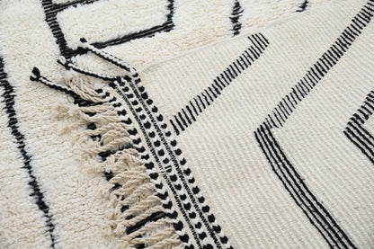Handmade beni ouarain rug cream and black geometric living room decor