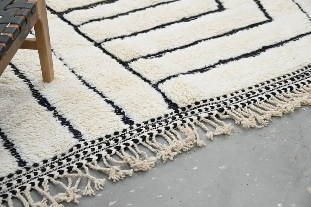 Handmade beni ouarain rug cream and black geometric living room decor