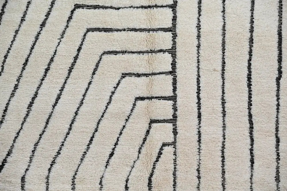Handmade beni ouarain rug cream and black geometric living room decor