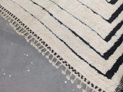 Handmade cream and black beni ouarain rug living room decor