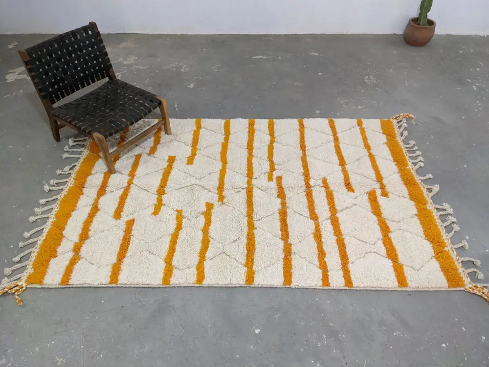 Handmade cream & orange beni ouarain rug bedroom moroccan decor