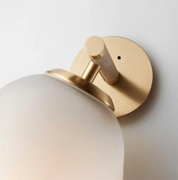 DecorBites™ Moroccan Title: Sleek Glass Wall Sconce