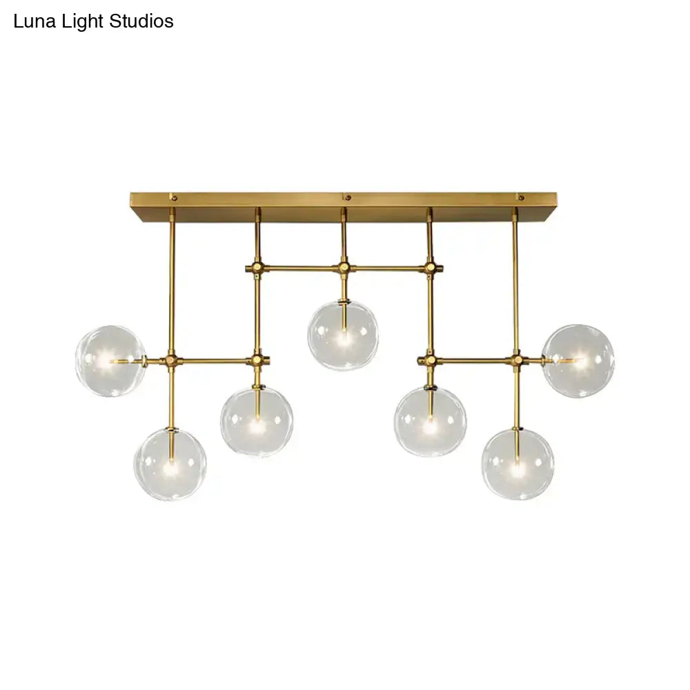 Modern brass and black clear glass sphere ceiling light dining room