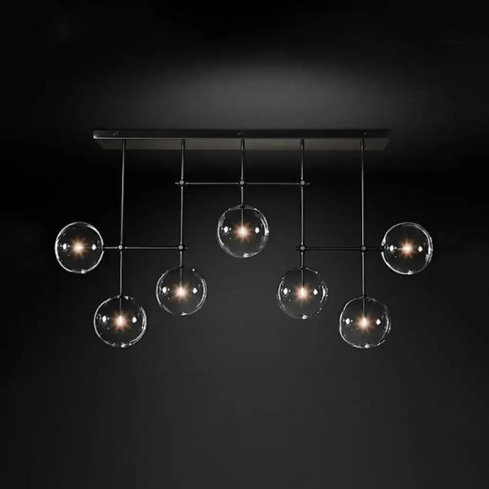 Modern brass and black clear glass sphere ceiling light dining room