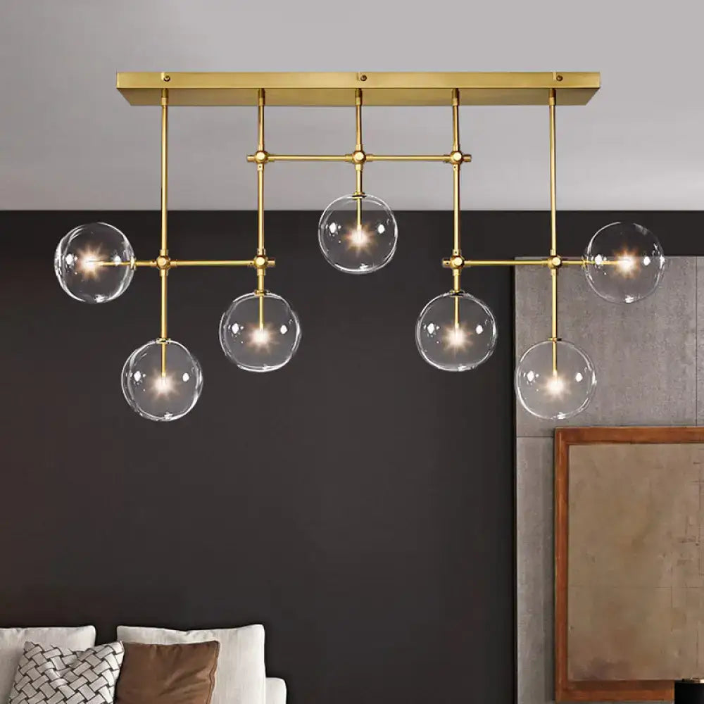 Modern brass and black clear glass sphere ceiling light dining room